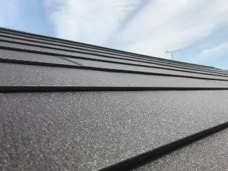 スーパーガルテクトへ葺き替え工事後の屋根